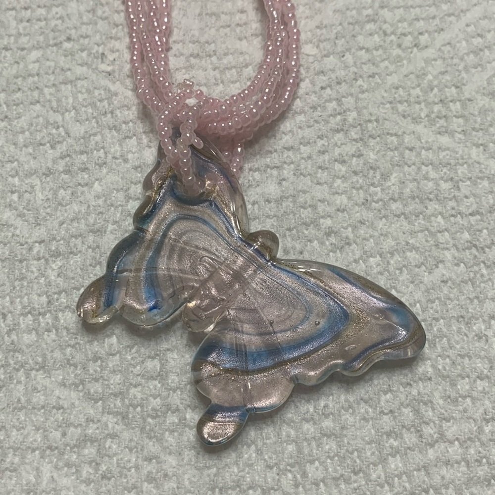Necklace/choker with glass like butterfly and tiny pink pearls